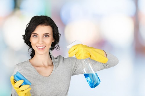 Careful cleaning of a sofa in a Balham flat with limited access